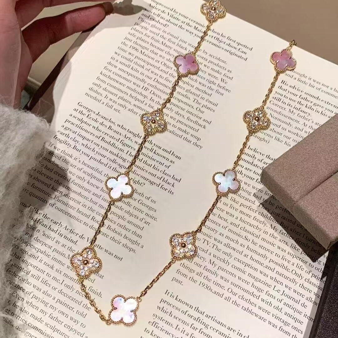 {
"Love Lucky": "Love Lucky",
"CLOVER 20 MOTIFS DIAMOND PINK MOP NECKLACE": "COLLAR DE 20 MOTIVOS DE TRÉBOL CON DIAMANTES Y NÁCAR ROSA"
}