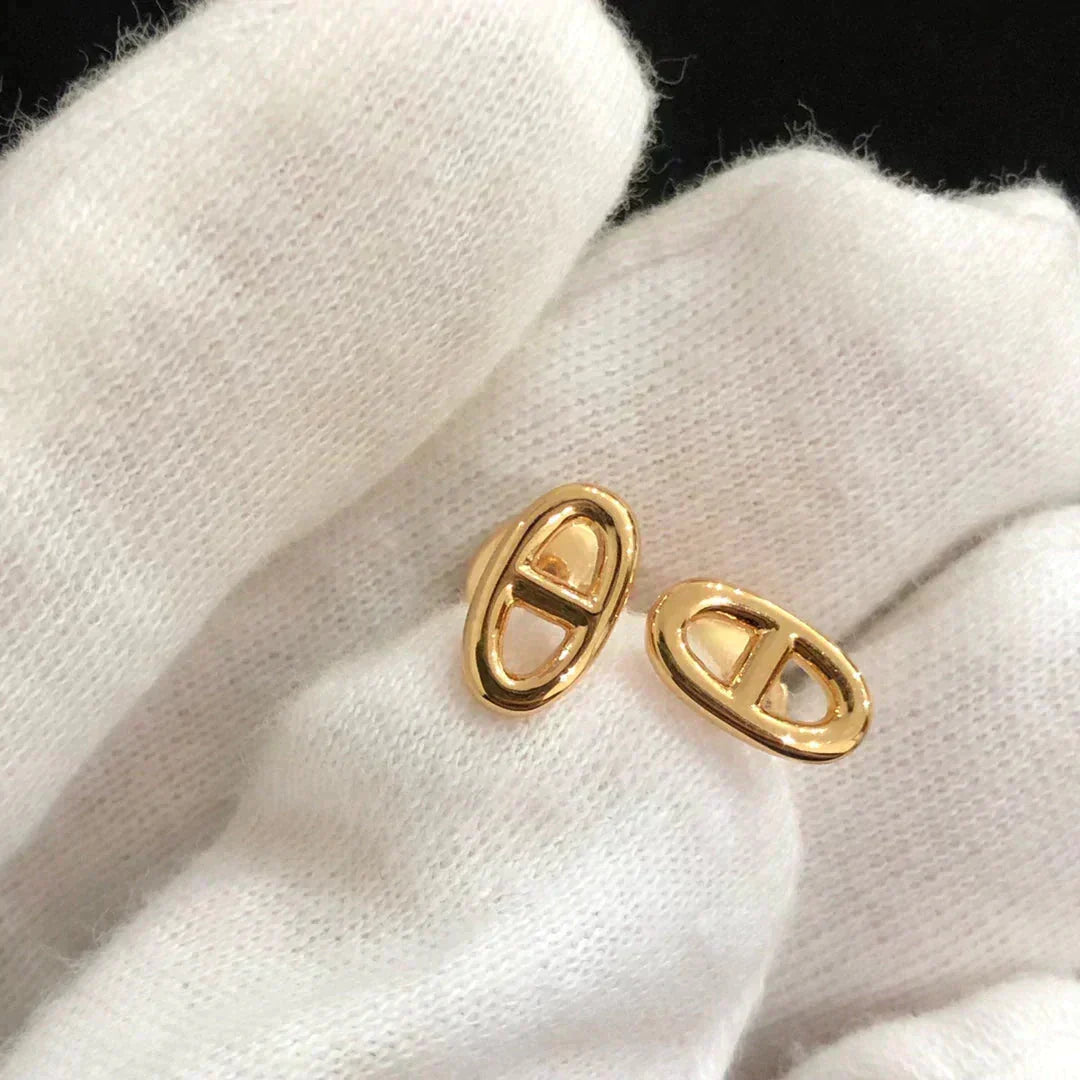 {"Love Lucky":"Love Lucky","CHAINE SMALL EARRINGS GOLD AND SILVER":"PETITES BOUCLES D'OREILLES CHAÎNE OR ET ARGENT"}