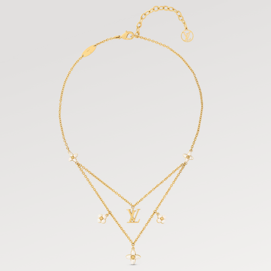 {
  "Love Lucky": "Love Lucky",
  "FLOWERGRAM GOLD MOP DOUBLE ROW NECKLACE": "COLLAR DE DOBLE HILERA FLOWERGRAM EN ORO Y NÁCAR"
}